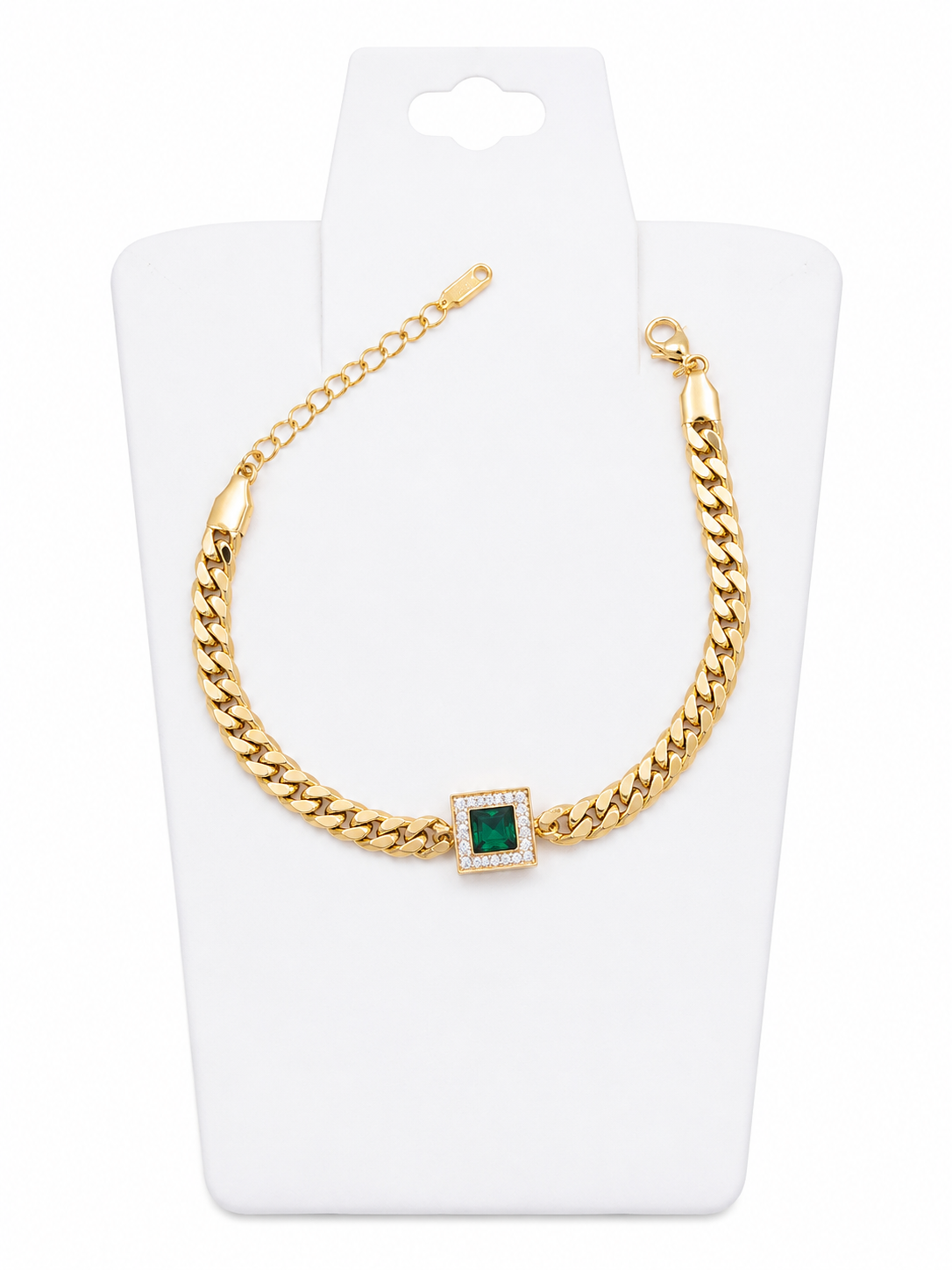 Pulsera de eslabones color dorado con cristal verde cuadrado y detalles de circonita ajustable.