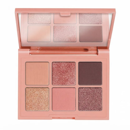 Paleta de sombras de ojos en el tono Coral Me Maybe, que cuenta con 6 tonos cálidos.