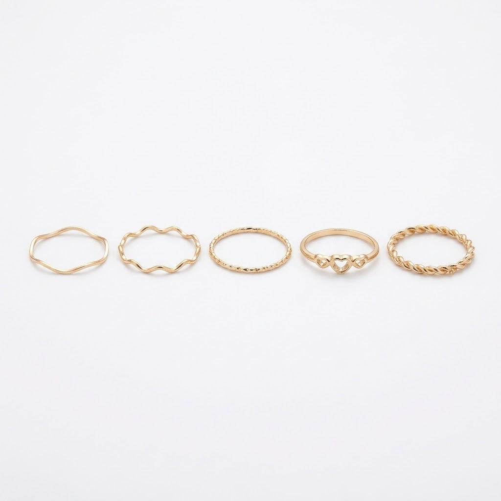 Set de 5 Anillos Dorados con Diseños Variados, Trenzados y Ondulados.